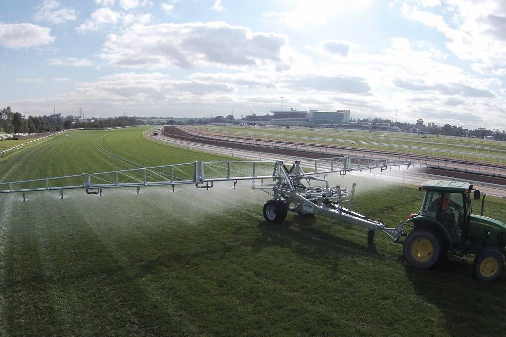 One of the new irrigators in action on Flemington racecourse.