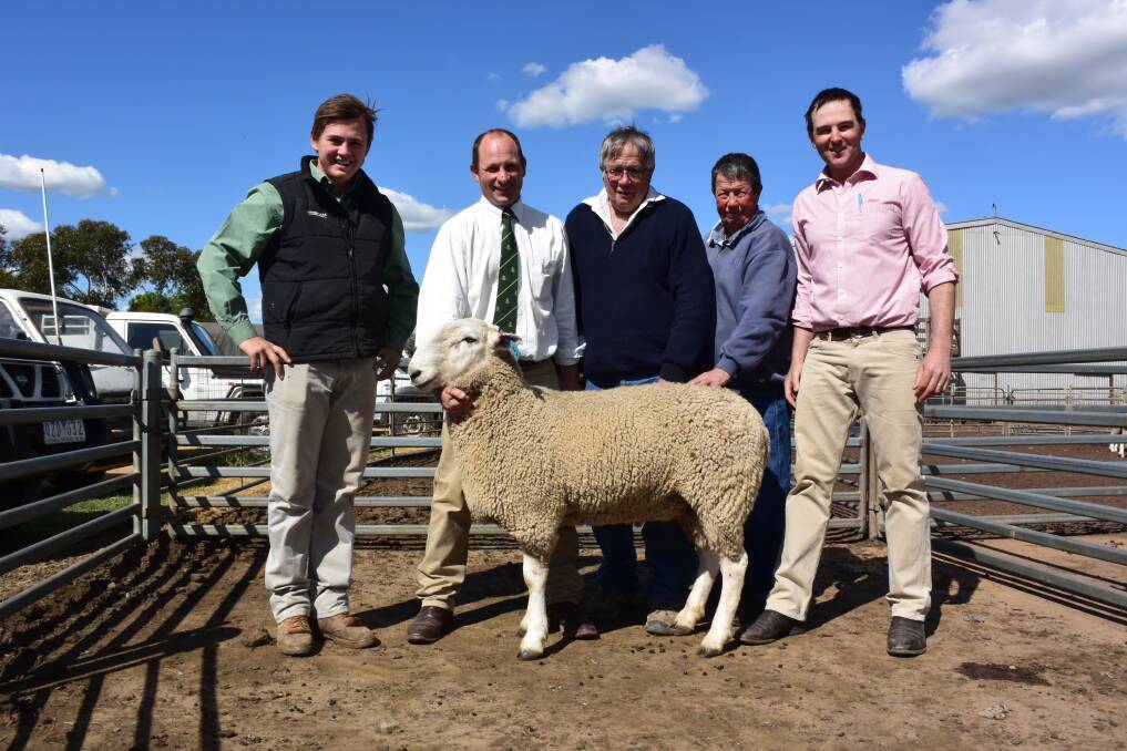 Landmark Echuca agent Lachlan Collins (left), Womboota Border Leicesters' Malcolm Starritt, buyers of the top-priced ram Laurie and Ray Boyd, Mologa, and Elders Echuca auctioneer Matthew O'Connor.