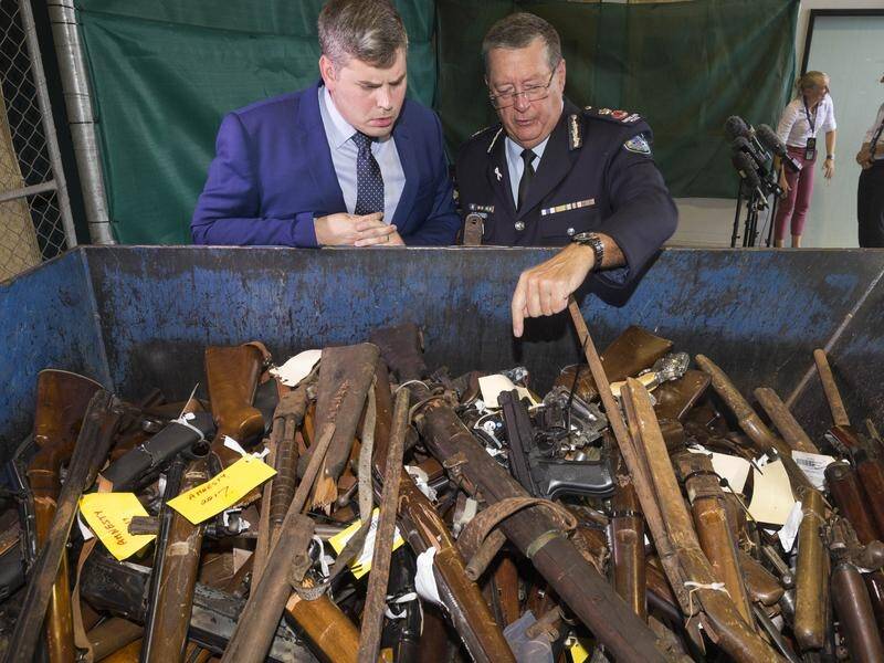 Police Minister Mark Ryan and Commissioner Ian Stewart say 869 weapons have been seized.