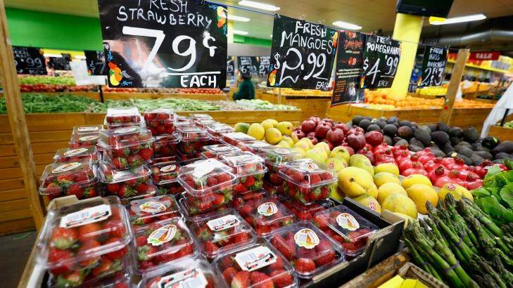 Stawberries selling for 79 cents in the Melbourne suburb of Brunswick on Monday.  Photo: Darrian Traynor