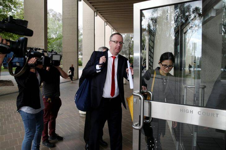 Legal representatives arrive at the High Court in Canberra on Tuesday 10 October 2017. The court will consider the eligibility of seven politicians in a three day hearing. Fedpol. Photo: Andrew Meares 