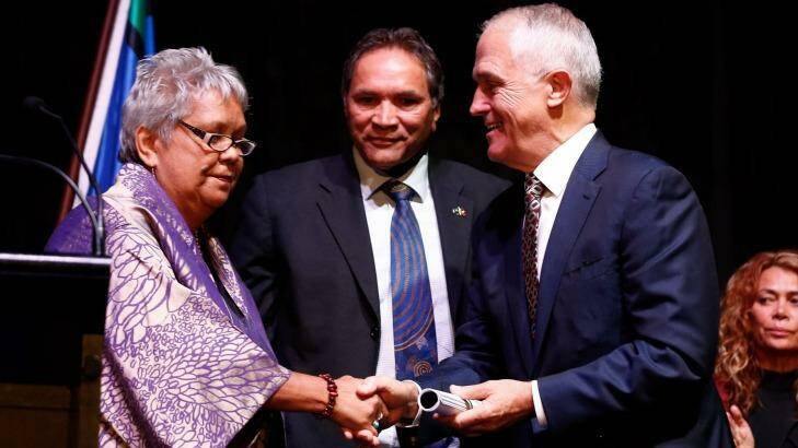 National Congress of Australia's First People's co-chairs Dr Jackie Huggins and Rod Little present the Redfern Statement to Prime Minister Malcolm Turnbull on Tuesday. Photo: Alex Ellinghausen