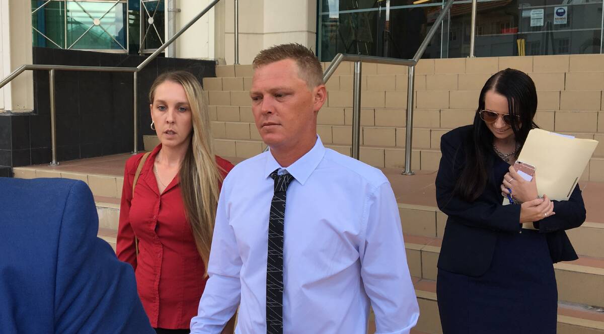 Luke Orchard (in light blue) leaving Rockhampton Magistrates Court today. Photo - WIN News. 