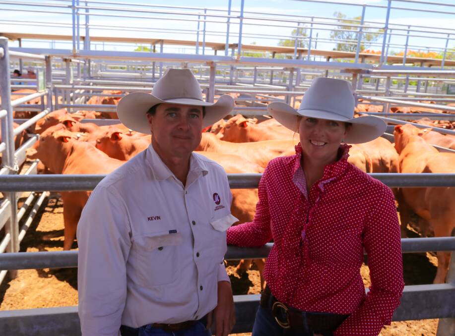 Kevin and Leesa Woolcock, Mostyndale Droughtmasters, Springsure, with their champion pen of steers in Emerald. 