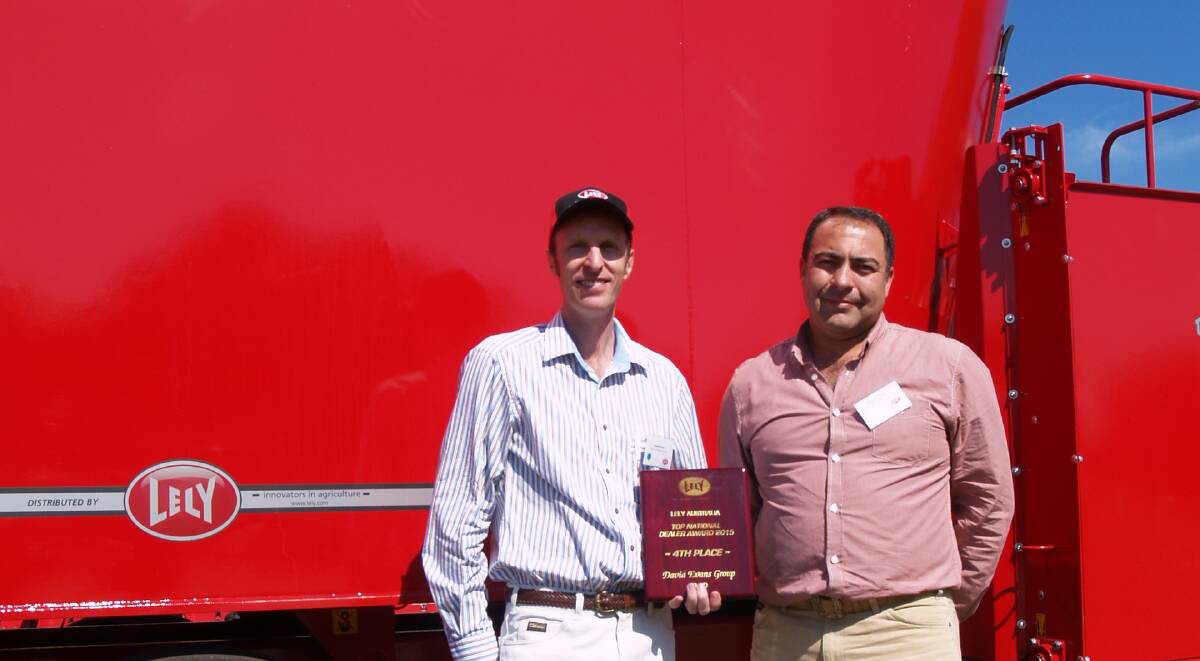 AWARD WINNERS: Steven Kiem and Andres Milesi from David Evans Group in front of Lely’s new Tulip Biga feed mixer.