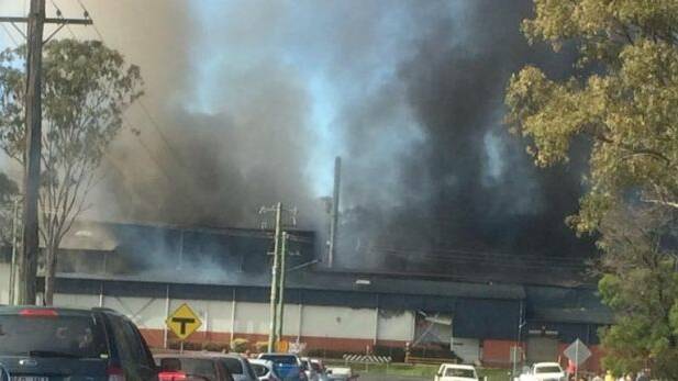 A Kingaroy factory fire sent thick plumes of potentially toxic smoke into the air on Sunday morning. Photo - Ruth McManus (Facebook)