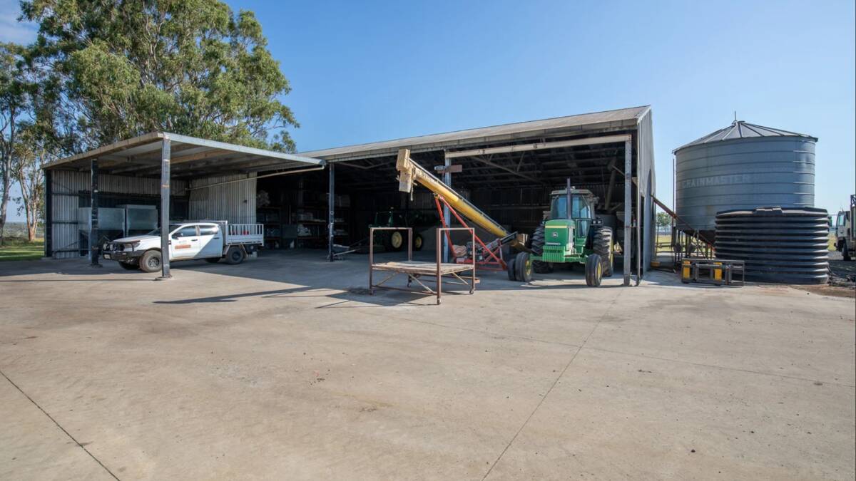 There is a large concreted area with two large machinery sheds with three phase power connected. Picture supplied
