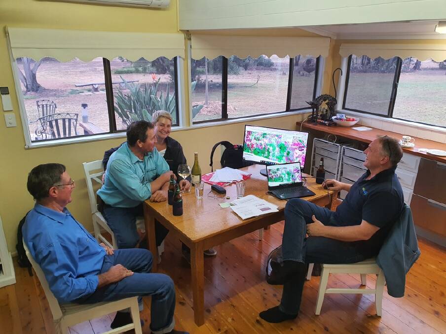 Forage Budgeting in 2021- Ian Stark and Jeanne Seifert, sitting at the kitchen table on a rainy afternoon on their 3500ha 'Wonga' Jandowae property and assessing the feed they have on offer at their 6000ha property at Chinchilla with grazing consultant Col Paton, and Phil Tickle from Cibo Labs. 