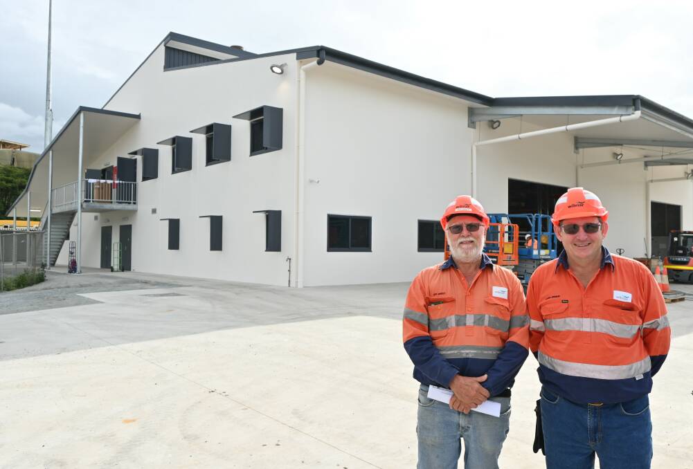 Vesuvian contractor Jeff Arnold, and Wilmar reliability engineer, Laurie Johnson, outside Proserpine Mills new store building. 
