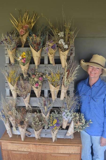 Danni-ann Hogan with some of the bunches she sent to the Capella School.