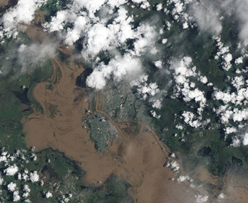 Heavy rains pushed the Fitzroy River to break its banks and submerge much of Rockhampton at the beginning of 2011. Credit: NASA.