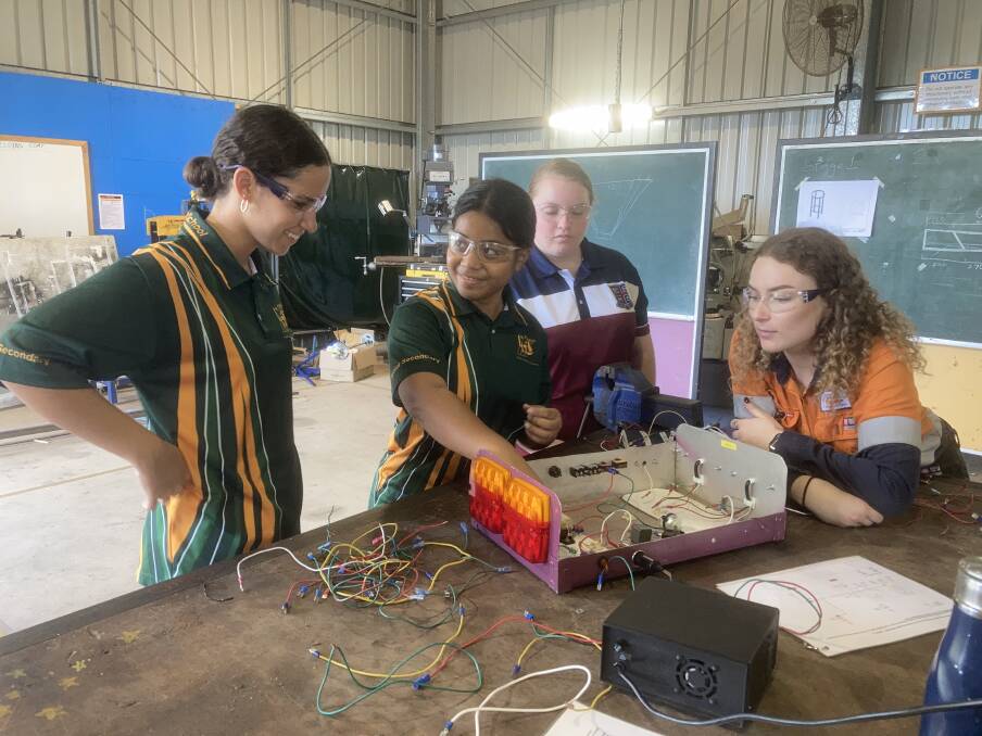 Young women from Moranbah and Mackay had opportunities to become tradies at 'All Female Tradies for a Day' events. Photo: supplied. 