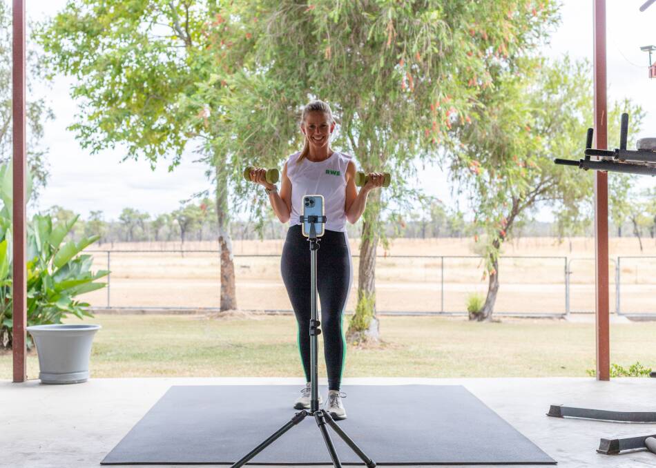 Melissa Neilsen is a grazier and a personal trainer who leads rural women through online workouts from her property located 110kms north of Hughenden. Photo: Zoe Thomas. 