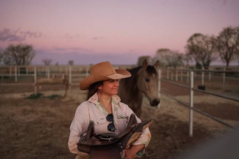 Former Melbourne girl Chloe Ferris packed up her life and headed north to work as a station hand at Barkly Downs Station. Picture: Supplied by Chloe Ferris. 
