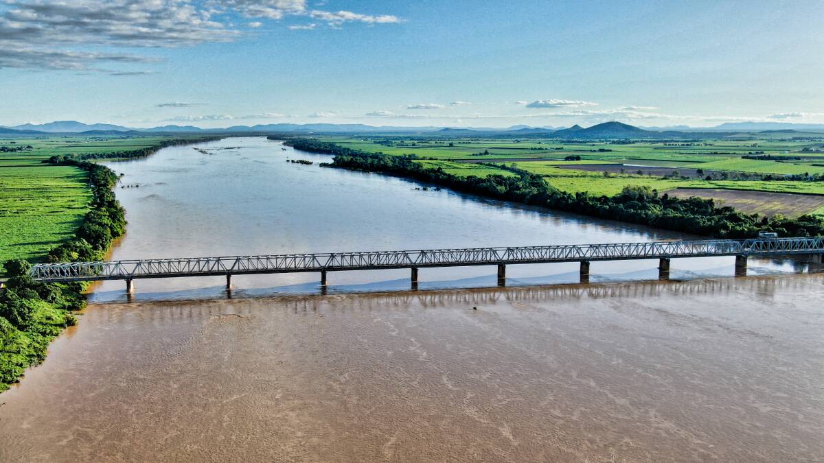 Mark McDonald of Burdekin Drones shared images online of the Burdekin River flowing steadily under the Burdekin Bridge over the weekend. Photo credit: Burdekin Drones. 