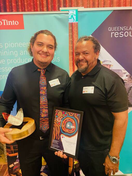 William Matters with his dad Ted Matters at the award ceremony in Brisbane. Picture: Hastings Deering. 