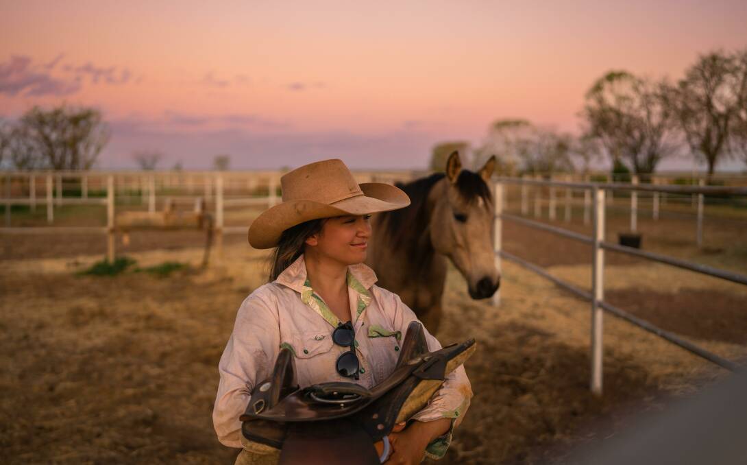 Former Melbourne girl Chloe Ferris packed up her life and headed north to work as a station hand at Barkly Downs Station. Picture: Supplied by Chloe Ferris.