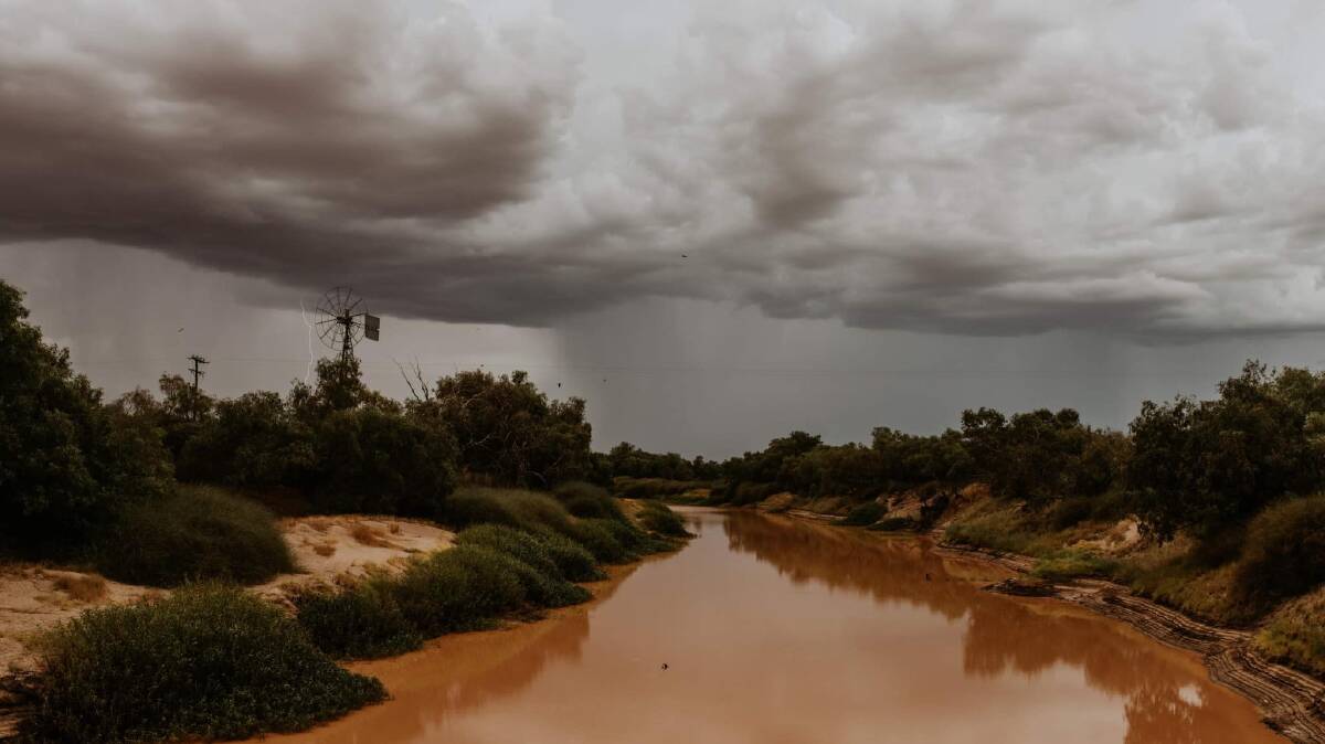 Thick rain clouds sweep across Birdsville in December. Picture AliB Photography.