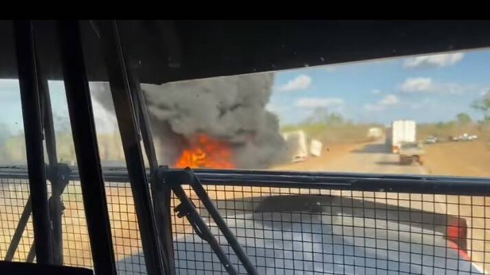 Six people - including four children - have lost their lives in a fiery crash on the Stuart Highway north of Katherine. Photo - dash cam still via Nigel Stevens, Facebook.