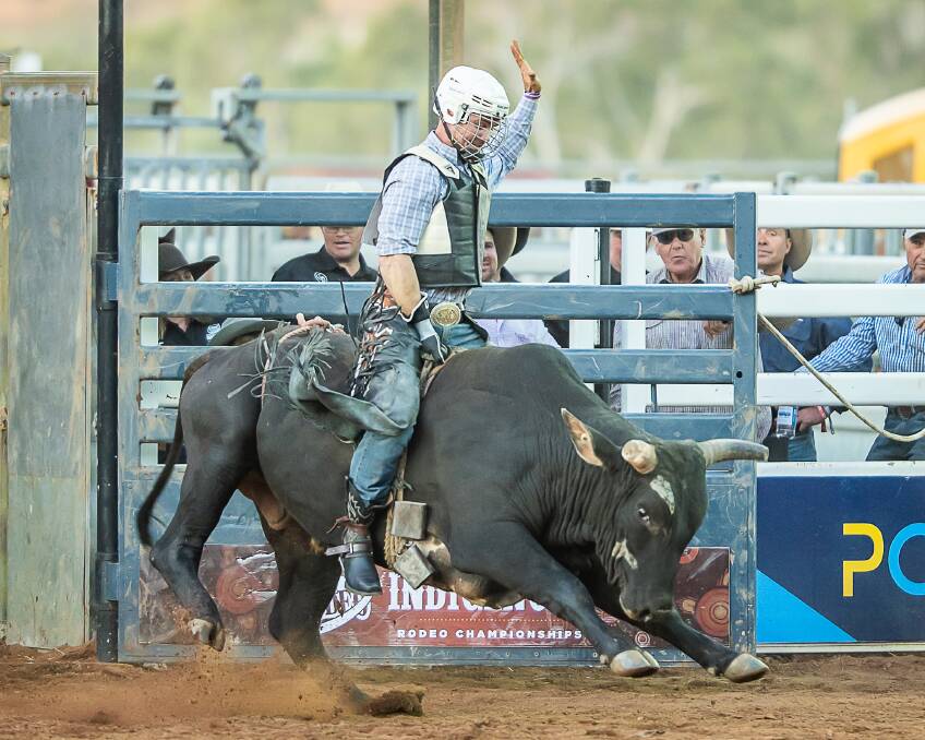 Darcy McBean on 'Dacky' for 71 points to win bull riding champion at the 2023 Mount Isa Mines Indigenous Rodeo Championships.