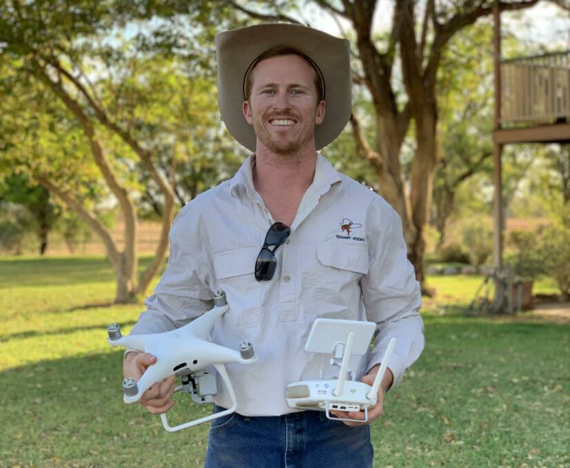 Luke Chaplain with a drone his uses for livestock management. Picture: Supplied Luke Chaplain