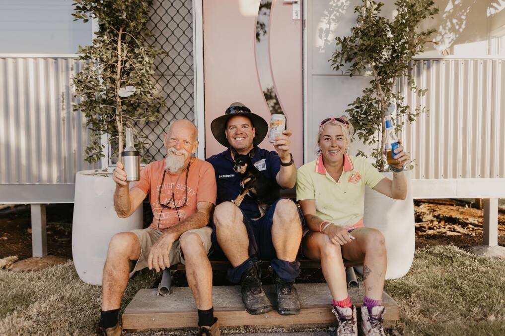 Nat Redgrave with Barry Redgrave and Tania White outside former "crack den" turned dream cottage. Picture: Libby Twine Photography.