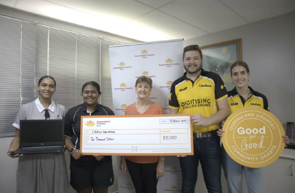 All Souls St Gabriels School students Rowena Pitt-Stephen and Tianiwa-Aroha Lenoy with Queensland Country Bank Charters Towers manager Susan Murphy and LiteHause International representatives Rob Birnie and Emma Laird. Picture: supplied by Queensland Country Bank.