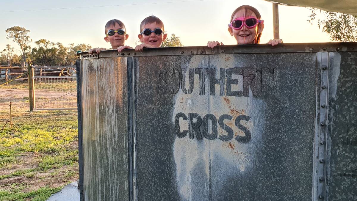 Clancy, Fletcher and Lucy Hawkins having fun at Taree Station. Image: supplied by Genevieve Hawkins.