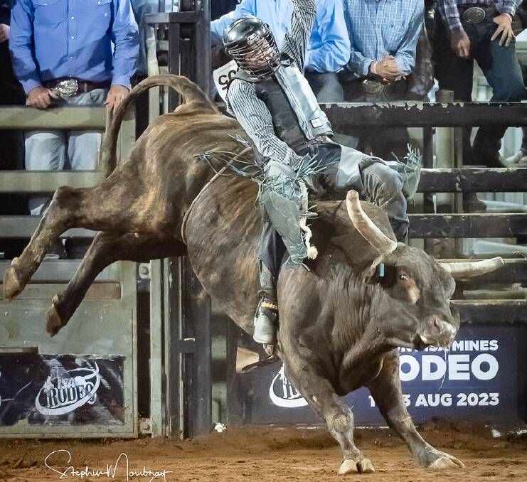 Boston Leather wins the Open Bull Ride at the 2023 Mount Isa Rodeo. Picture Stephen Mowbray Photography