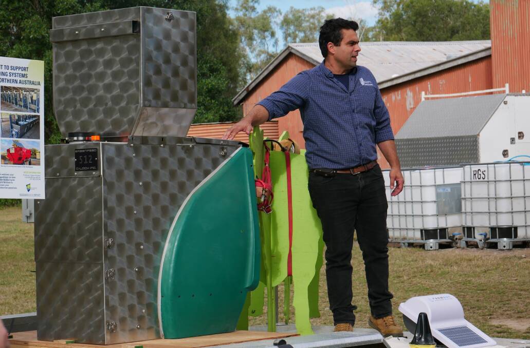 Dr. Fleury Azevedo Costa points to an example of a greenfeed unit. Picture by Ellouise Bailey 