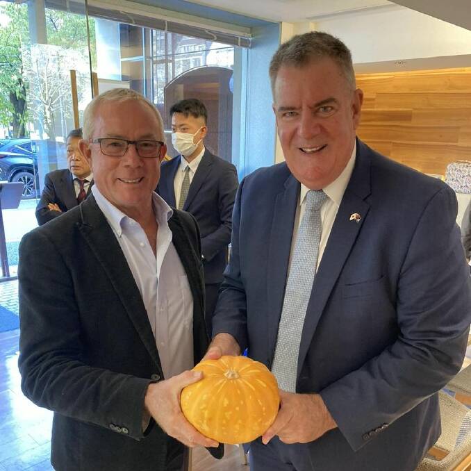Lakeland melon and pumpkin grower Shaun Jackson who exports his produce to Japan, including his niche melon varieties, with Agriculture Minister Mark Furner. Picture: supplied 