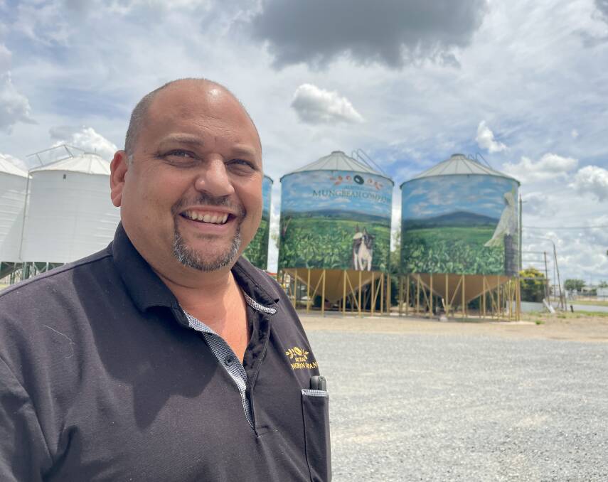 Damien White of the Australian Mungbean Company with some of their colourful silos. Picture: Judith Maizey