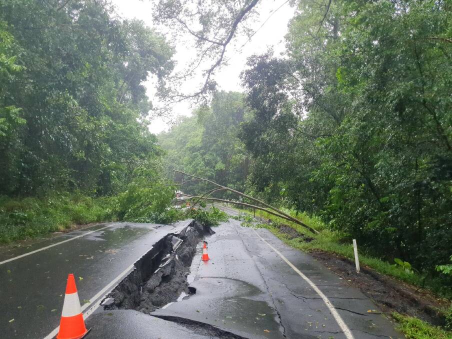 Massive cracks in the road on the Palmerston Highway due to ex-Cyclone Jasper have made the key route for farm produce undriveable. Picture: TMR 