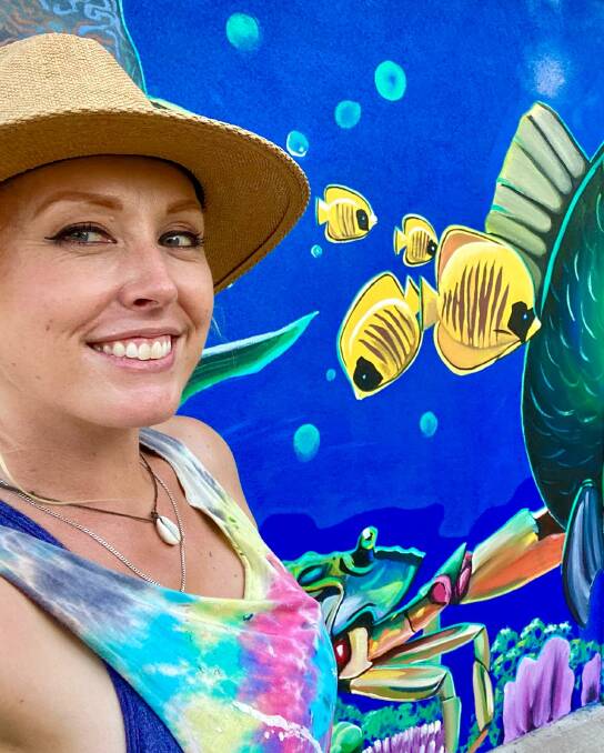 Visual artist Lavinia Letheby has been named as a finalist in the Community Art Sector category for 'Under the seas', a mural painted in conjunction with Lucinda Progress Association at Borello Park, in the Hinchinbrook Shire. Picture: Supplied