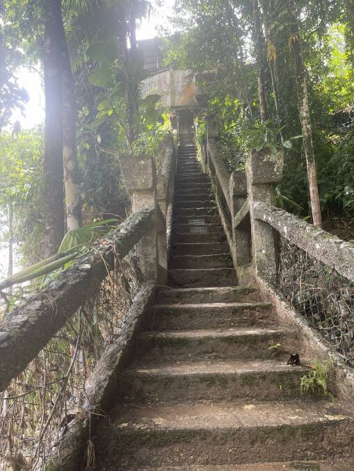 Place markers on the stairway down into the park show the flood level heights of storms over the years. Picture: Steph Allen