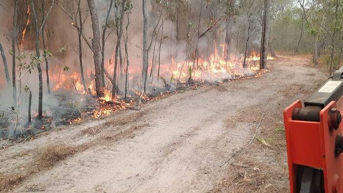 Back burning was implemented to help contain the fires. Picture: Martin Bella