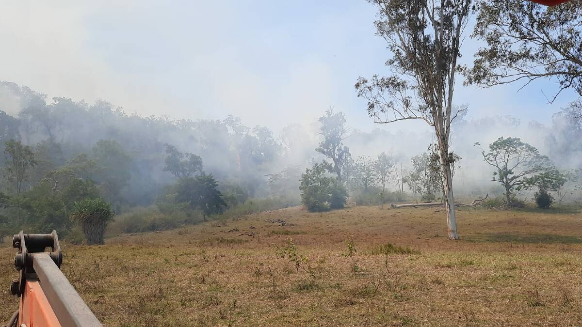 Residents banded together to contain the blazes alongside fire fighting crews. Picture: Martin Bella