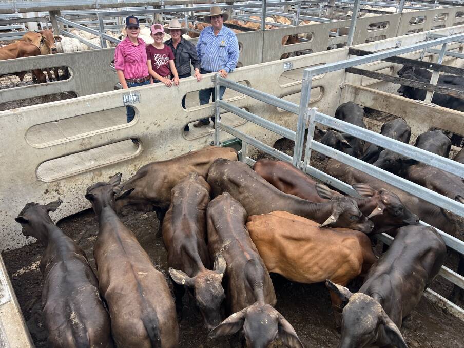 BDA agent Joel Dawson with Tamara Jones and her daughters Annalise and Bonnie (AA & TF Jones) who sold a pen of Brangus steers for 402.2c/kg, averaging 261.54c/kg for a return of $1051.92/head. Picture: CQLX