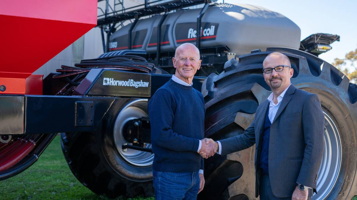 DONE DEAL: Peter Sweeney, retiring managing director and previous owner of Horwood Bagshaw with CNH Industrial, Australia and New Zealand, executive managing director, Michele Lombardi.