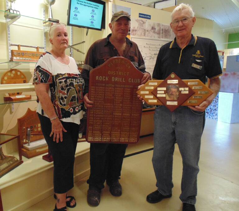 Gail and Smiley (Kevin) Wharton, and Herberton Mining Museum volunteer Ivan Searston with the plaques now on permanent display in the centre.
	
