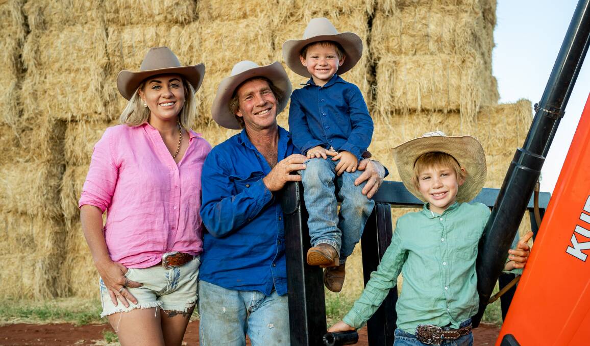 Danyelle and Anthony Haigh, with their two sons will feature in a new television series - Outback Farm. Picture supplied.
