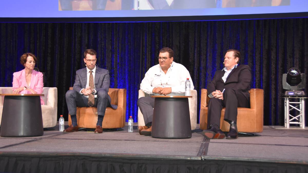 MLA's Jason Strong, second from right, speaking on a panel at the AMIC conference with Australian Pork's Margo Andrae, AMPC's Chris Taylor and AMIC's Patrick Hutchinson.