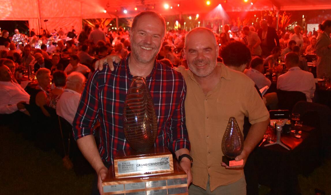 Mayura Station's Scott deBruin and farm manager Mark Oliver collect the Grand Champion prize in the Wagyu Branded Beef Competition. Picture Shan Goodwin.