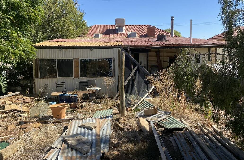 Who knows what you might find underneath after giving this South Australian house a clean-up.