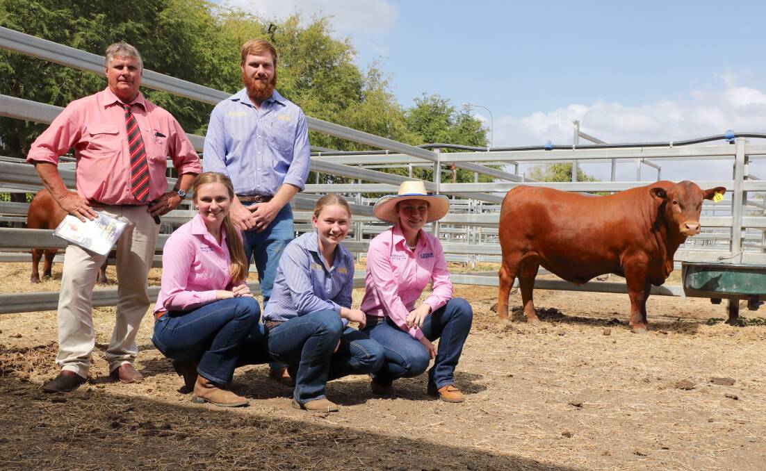 Record breaking Senepol bull, the $27,000, 5 Star M71013 (22-months) is pictured with Brian Wedemeyer, Elders Stud Stock, Rockhampton and Guthrie Maynard, 5 Star Senepol Stud, Jambin. In the front with the bull are Sabrina, Faith and Bonnie Maynard, 5 Star Senepol Stud, Jambin.