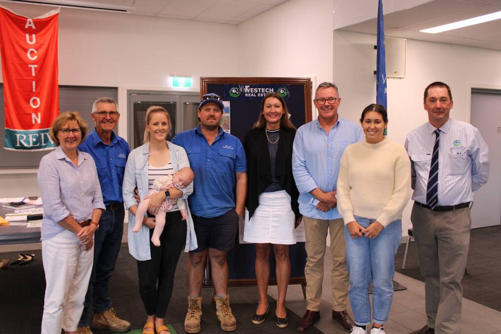 BIG PURCHASE: From left to right land buyers the Eastwood family, Diane, Malcolm, Abbie, holding Isla, and Sam and the Drummond family, Kim, Peter and Penelope, representing the estate of the vendors, the Goodwin family, and agent Stuart Kyle, Westech Real Estate, following the record sale at Kaniva earlier in the month. 