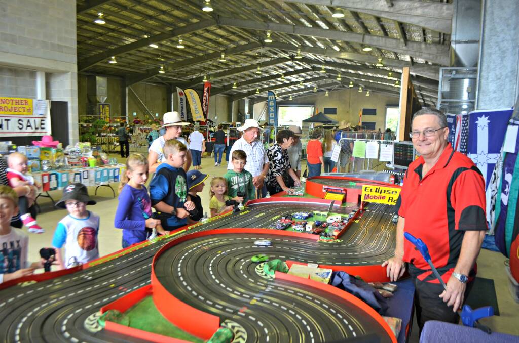Start your engines: Townsville's Alan Goss from Willows Mobile Slotcars always draws a big crowd of kids and adults to the amazing interactive RC track.