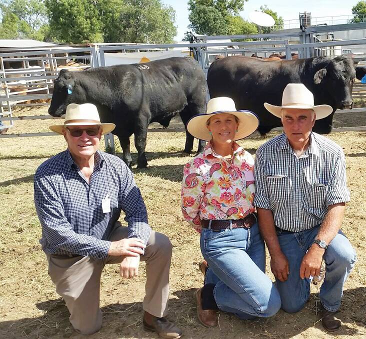 Show success: Wes and Sue Presho (centre), with Murray Grant, Chemvet, at the 2017 Taroom show prime and store cattle competition where they won Grand Champion grass fed exhibit for their Santa x Angus steer.