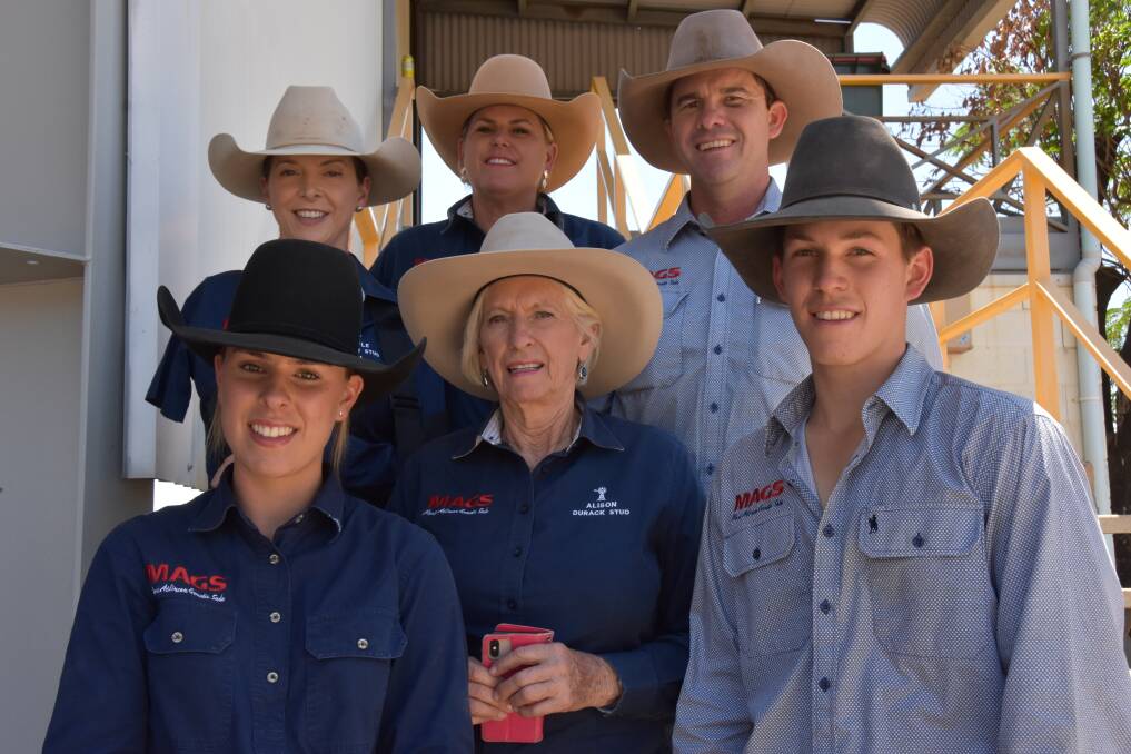 Gayle Shann, Kylie Graham, and Mac Shann, with (front) Ally Graham, Alison Atkinson, Tom Graham post-sale at the Dalrymple Saleyards. Picture: Steph Allen 