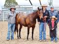 Marvellous mare: Cody O'Neill, vendor Tim Olive, buyer Simon Camm, and daughter Harriet, with Kooloombah Melody, the 2021 sale's top price lot.